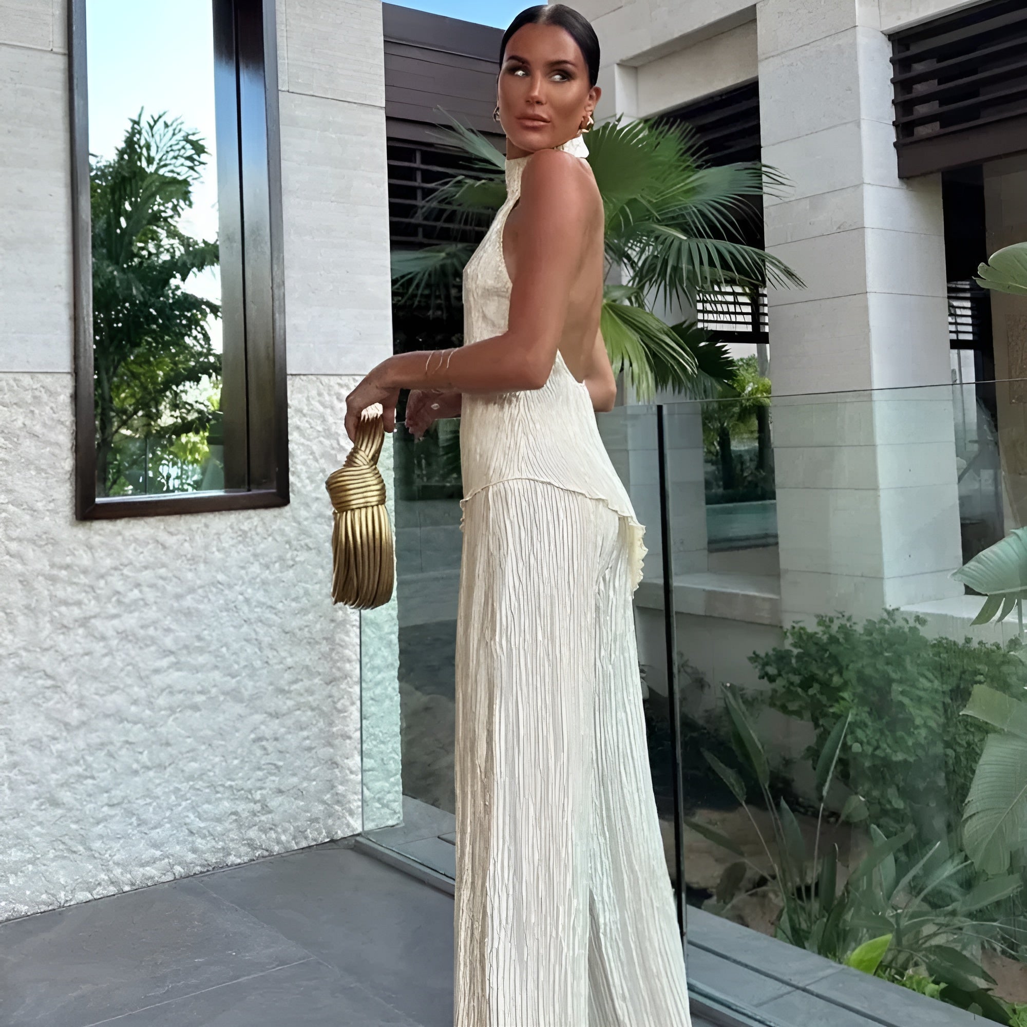 Aira | Womenâs Halter Backless Plisse Jumpsuit